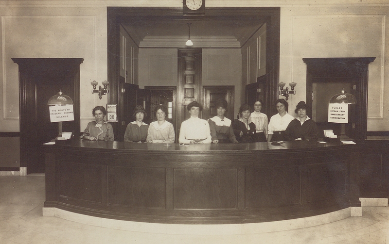 Bangor Public Library staff at the Reference Desk, 1914.
